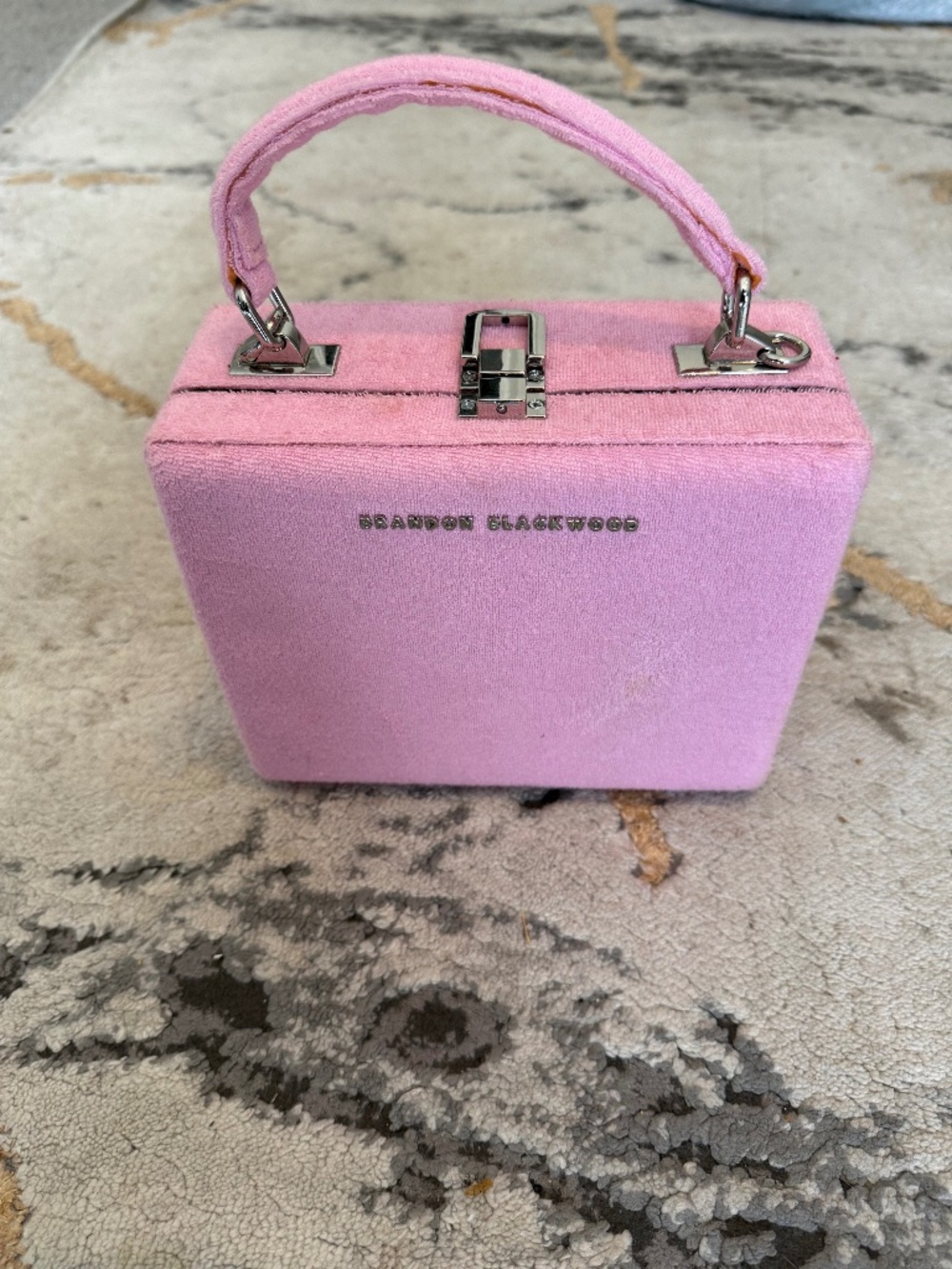 Light pink Brandon Blackwood trunk purse